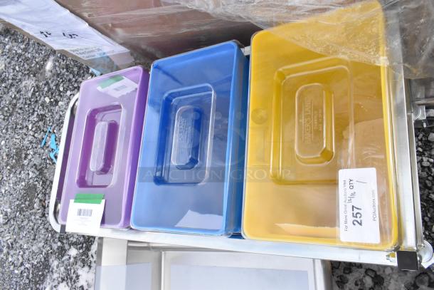 Brand new Baker's Lane 30-gallon mobile ingredient bin, model 176IBM3BLID, yellow/blue/purple. Scratch and dent condition.