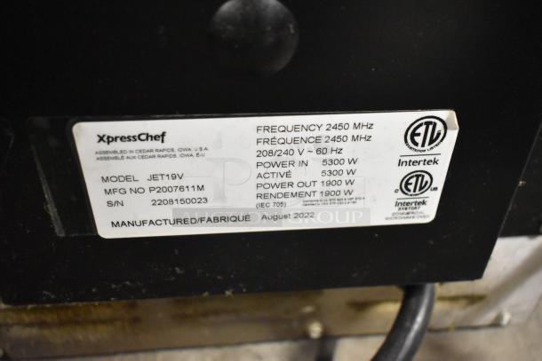 2022 XpressChef JET19V stainless steel rapid cook oven label, 208/240 volts, 1 phase, 5300 W input, 1900 W output, ETL certified.