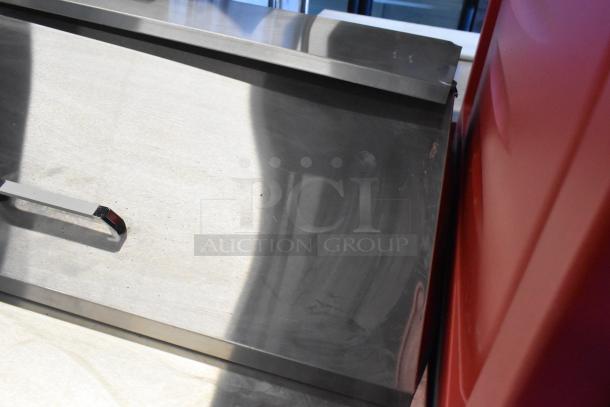 Brand new 2021 Atosa MSF8301GR stainless steel prep table; slight cosmetic scratches, commercial casters, 115V, 1 Phase.