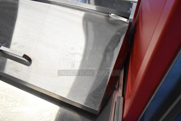 2021 Atosa MSF8301GR stainless steel commercial sandwich salad prep table, scratch and dent, on commercial casters.