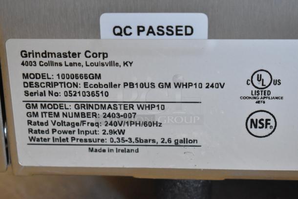 Brand new Grindmaster 1000666GM Ecoboiler label showing model details, 240V, 1 Phase, 2.9kW, QC PASSED.