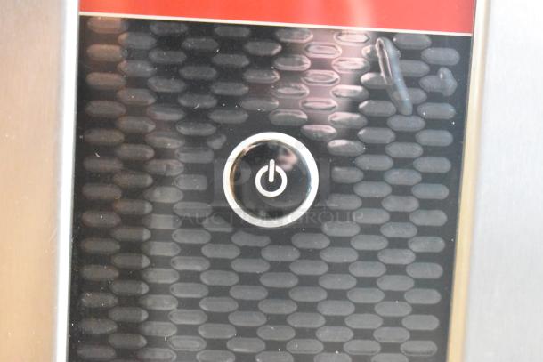 Grindmaster 1000678GM Ecoboiler Hot Water Dispenser, new, scratch and dent, stainless steel, 240V, 1 phase, power button detail.