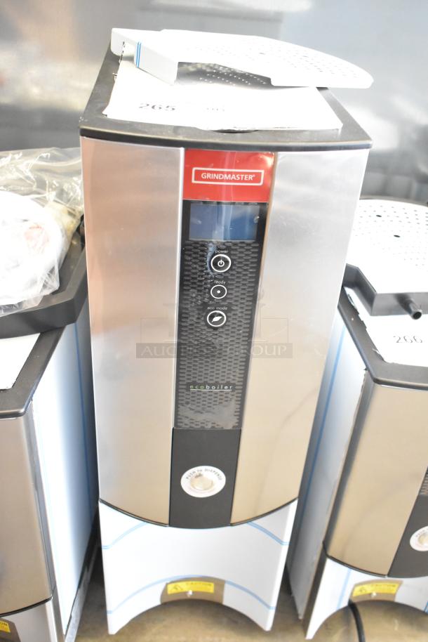 Grindmaster 1000678GM PB10USG stainless steel commercial hot water dispenser, brand new with minor scratches. Model label visible.