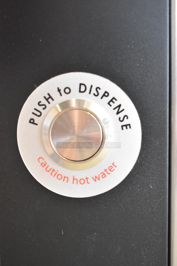 Grindmaster 1000678GM stainless steel hot water dispenser button with "Push to Dispense" and "caution hot water" text.