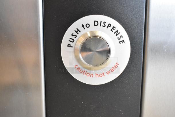 Brand new Grindmaster 1000665GM Ecoboiler, stainless steel, countertop hot water dispenser. "Push to Dispense" label shown.