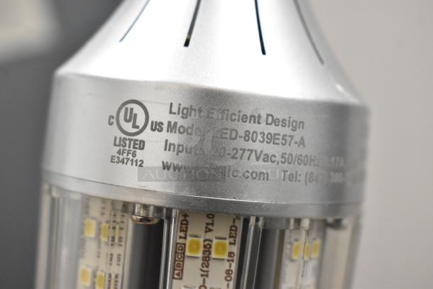 Close-up of a Light Efficient Design LED lightbulb, model LED-8039E57-A. Features 120-277VAC input, UL listed.
