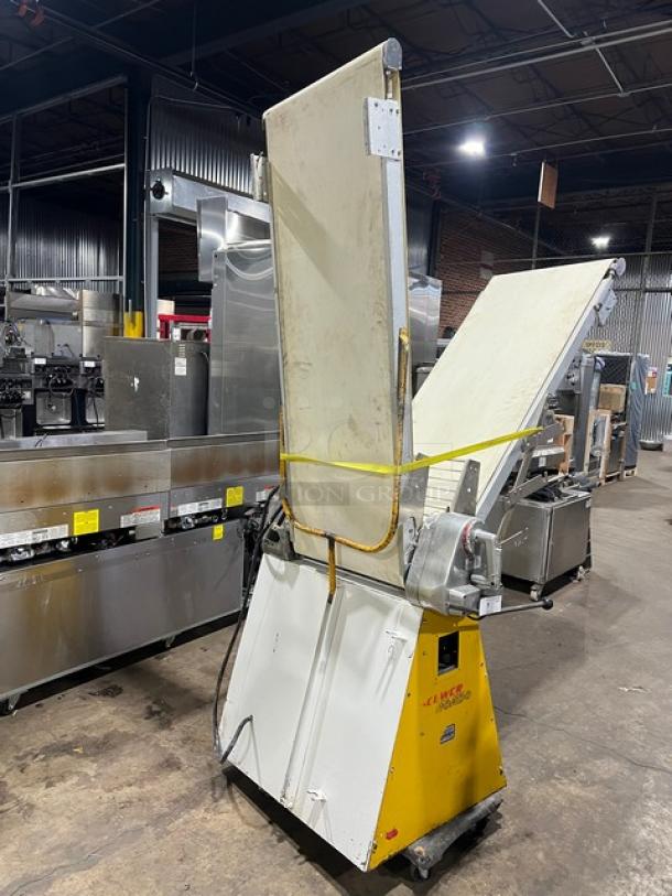 Seewer Rondo SS063 electric dough roller/sheeter with conveyor, model SS063 SN A-3088002, commercial grade, reversible.