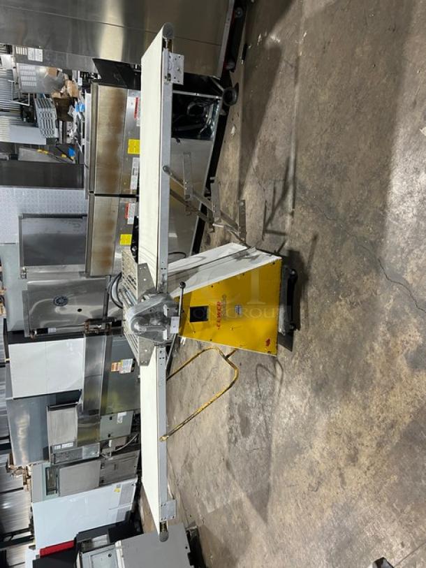 Seewer Rondo commercial electric dough roller, Model SS063, SN: A-3088002. Reversible conveyor belt, used condition.