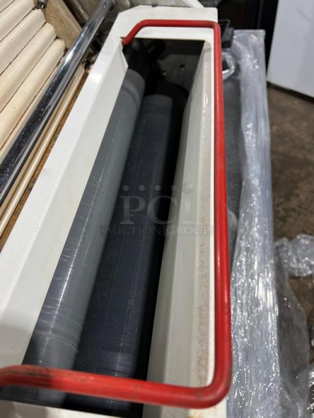 Merand Tenor 2 electric dough moulder, 220V, commercial countertop model, white with red handle, visible rollers.