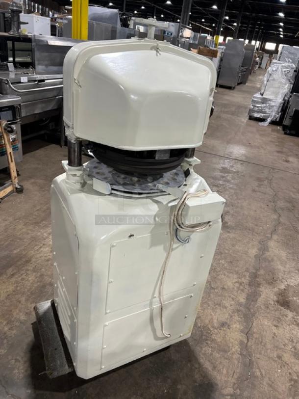 Gemini semi-automatic dough divider/rounder machine, white, electric-powered, includes rounding plate, industrial floor model.