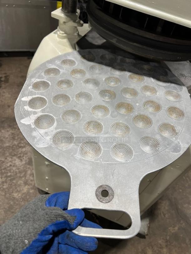 Gemini white semi-automatic dough divider/rounder with rounding plate. Commercial floor model. Good condition. Electric powered.