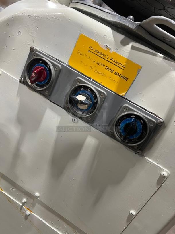 Gemini commercial white dough divider/rounder machine with control knobs. Includes rounding plate. Semi-automatic model.