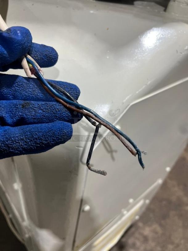 Gemini white electric dough divider/rounder machine with exposed wires, signifying repairs needed.