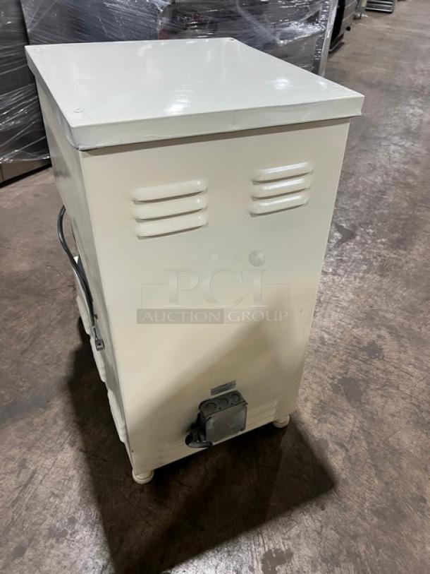 Morello white electric pizza dough spinner/stretcher machine on legs. Features cold system, commercial use, good condition.