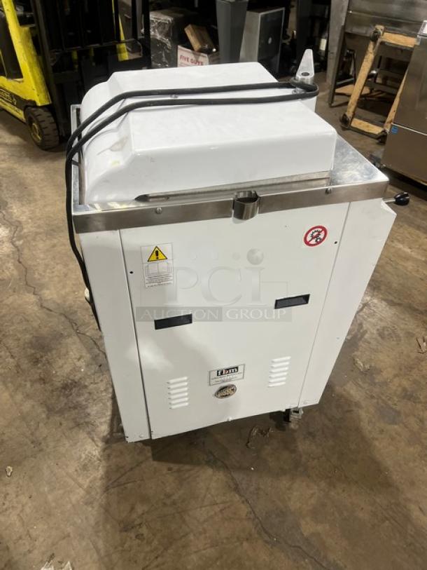 Bongard commercial white electric hydraulic dough divider, floor model, SN: 0102584, in good condition.