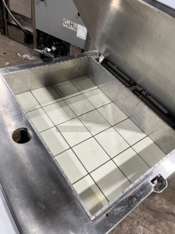 Bongard commercial electric hydraulic dough divider, stainless steel exterior, grid pattern inside, serial number 0102584.