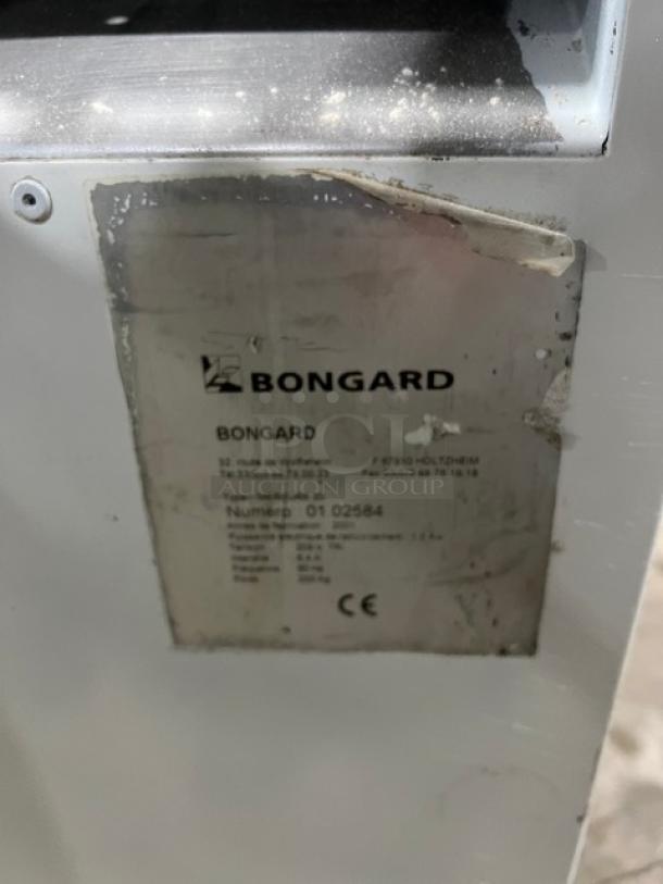 Bongard hydraulic dough divider, floor model, electric powered, serial number 0102584, worn label visible.