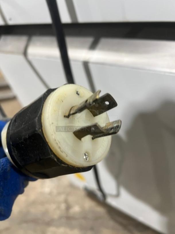 Bongard hydraulic dough divider, commercial-grade, electric-powered with visible power plug. Serial number: 0102584.