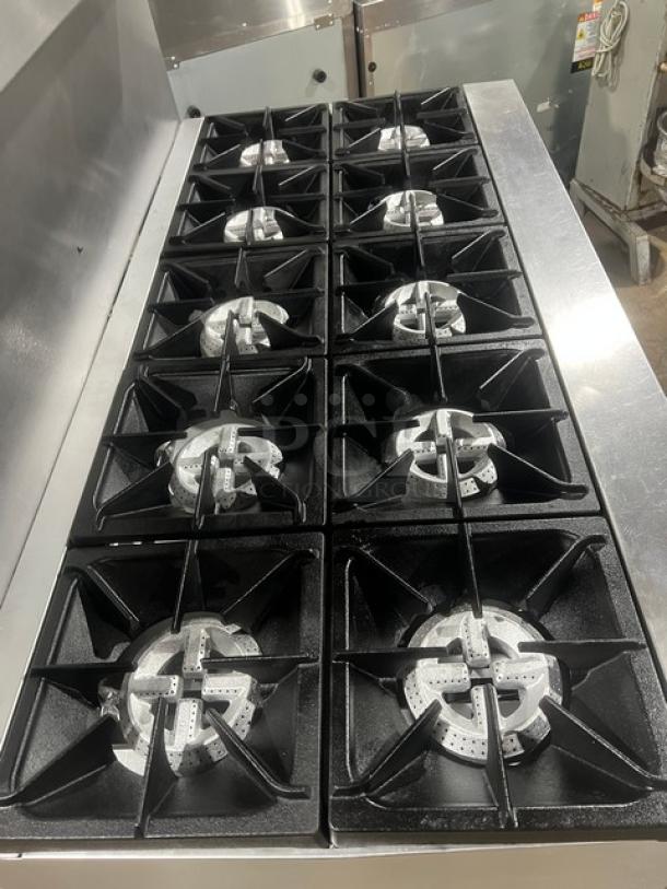 CPG S60N commercial 60" 10-burner range, stainless steel, natural gas, with double oven, backsplash, salamander shelf, on casters.