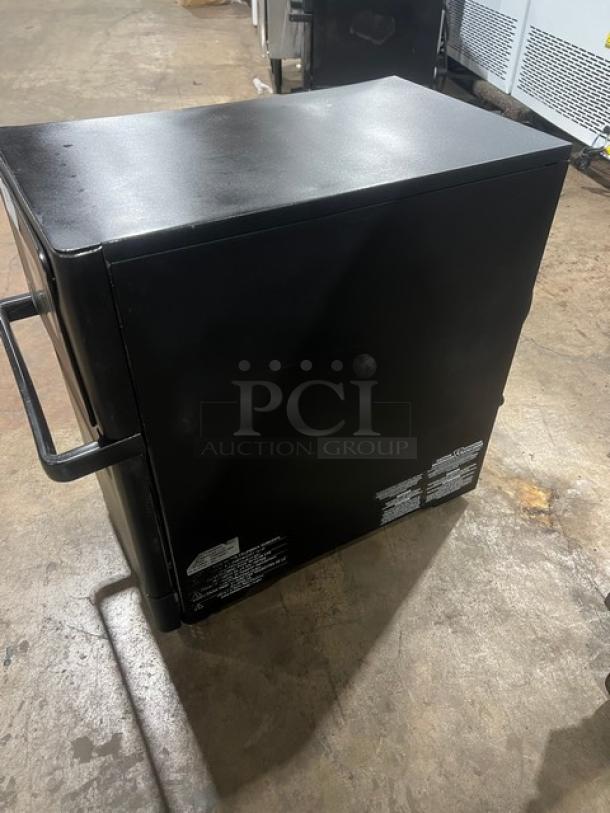 MerryChef Eikon E2S high-speed cook oven, black, electric, countertop model, 2022, visible labels with model and serial information.