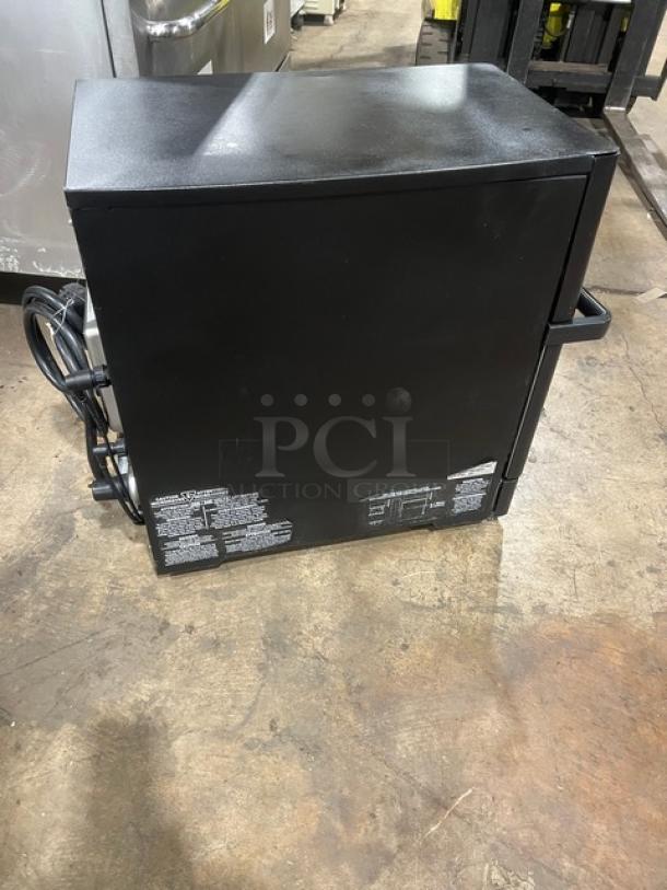 MerryChef Eikon E2S black countertop rapid cook oven, 2022 model, electric-powered, 208/240V 1 Phase, visible serial number.