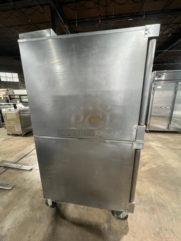 Vulcan SG4D1 stainless steel double stacked convection oven, natural gas, on casters, includes wired rack, model SN 481294700CW.