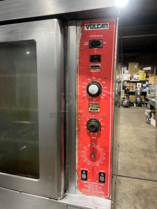 Vulcan SG4D1 commercial stainless steel double-stacked convection oven, natural gas, on casters, with wired oven rack. Visible control panel settings.