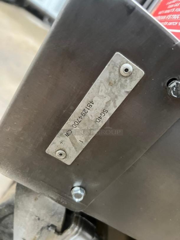 Vulcan SG4D-1 convection oven, stainless steel, natural gas, with tag showing SN: 481294700CW, mounted on casters.