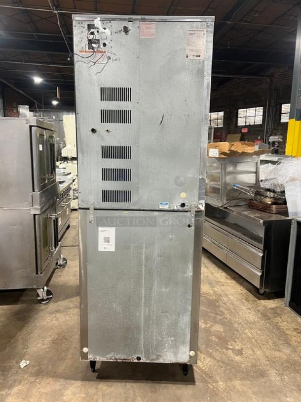 Hoshizaki stainless steel electric modular ice maker, Model KM-1340MRJ/B-500PF, on legs, 208-230V, 1 Phase, with visible tags.