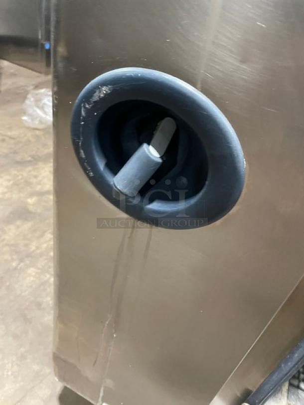 Rational SCC202 commercial combi oven handle, stainless steel, electric, on casters, with visible wear. Model SCC202.