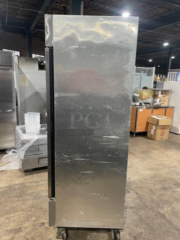 True T-23F stainless steel single door reach-in freezer on casters, with poly-coated wire rack, Energy Star certified, 115V 1 phase.