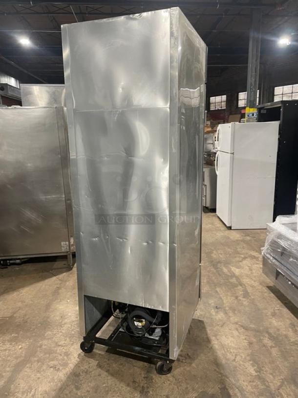 True Commercial T-23F Stainless Steel Single Door Reach-In Freezer, Energy Star Certified, on casters, with poly-coated rack.