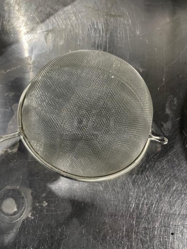Adcraft commercial stainless steel strainer with hardwood handle, heavy-duty design, excellent condition.