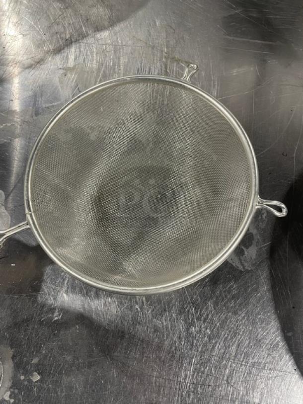 Adcraft stainless steel strainer with hardwood handle, heavy-duty, new condition, commercial-grade quality.