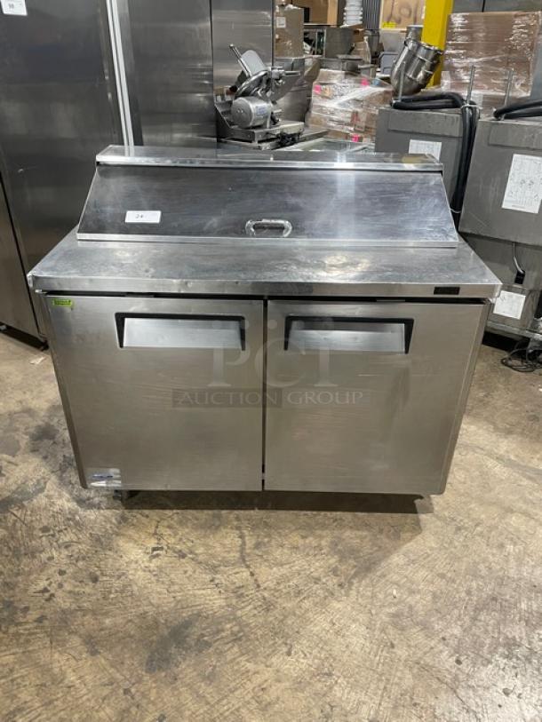 Turbo Air MST-48-N stainless steel 2-door refrigerated prep table with poly-coated rack, on casters, used condition.