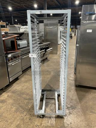 Commercial refrigerator/proofer rack in good condition on casters for easy mobility. Ideal for bakery or kitchen use.