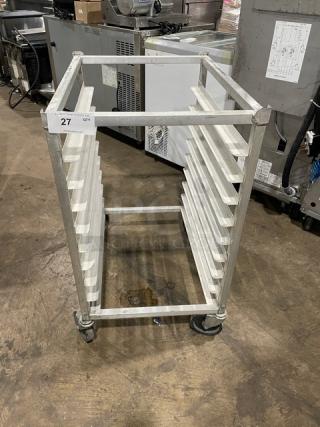 Commercial half-sized refrigerator/proofer rack on casters, metal frame with multiple shelf slots, tagged "27 QTY."