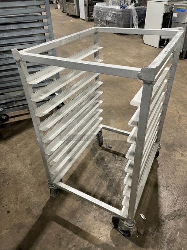 Commercial half-sized refrigerator/proofer rack on casters, metal, 10 slots, good condition, suitable for bakery use.