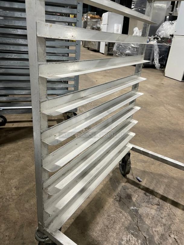 Commercial half-sized refrigerator/proofer rack on casters, metal construction, 11 shelves, used condition.