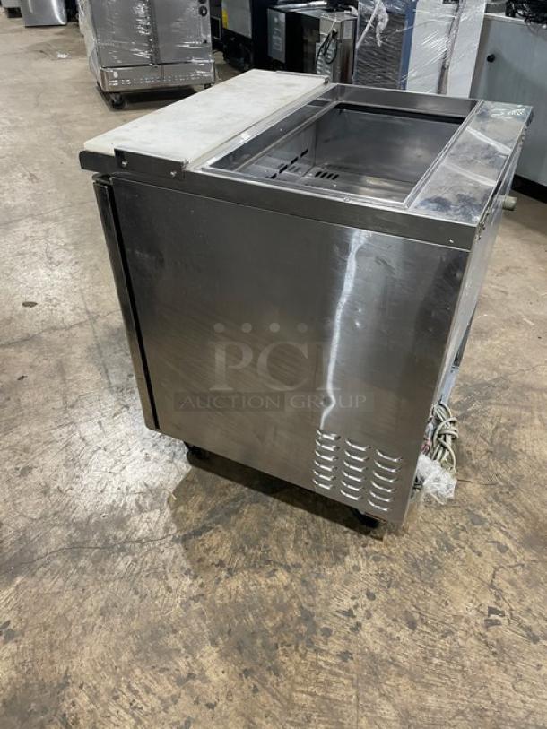 Turbo Air TST28SD stainless steel refrigerated prep table with cutting board, single door, casters, good condition.