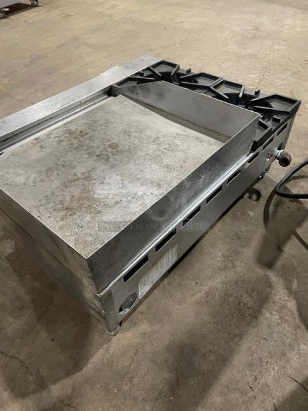 Comstock-Castle FHP36-24 stainless steel 2-burner griddle range, natural gas, with back and side splash, on legs.