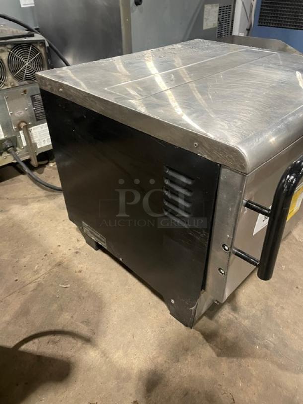 TurboChef Tornado Series NGCD6 rapid cook oven with stainless steel exterior, digital touch controls, and legs. Electric, 208/240V.