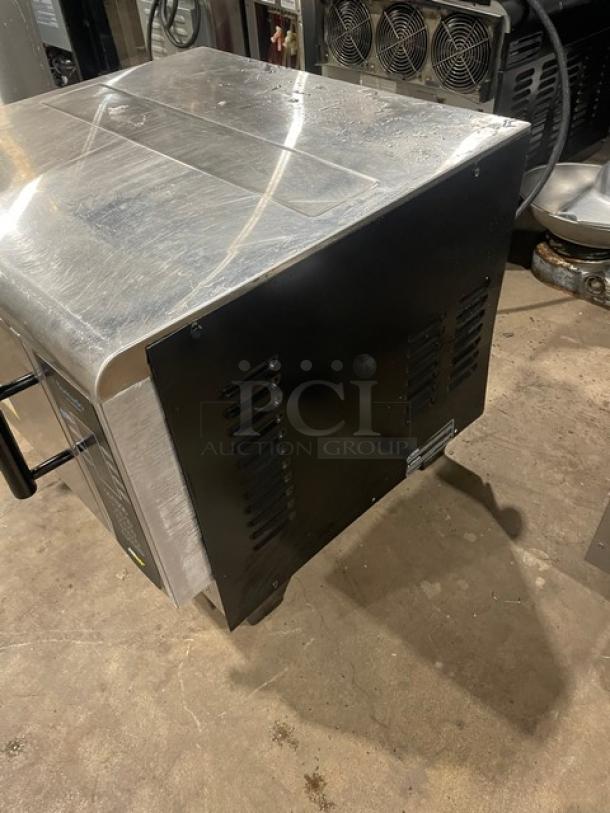 TurboChef Tornado Series NGCD6 countertop rapid cook oven, stainless steel, electric, digital touch controls, on legs.
