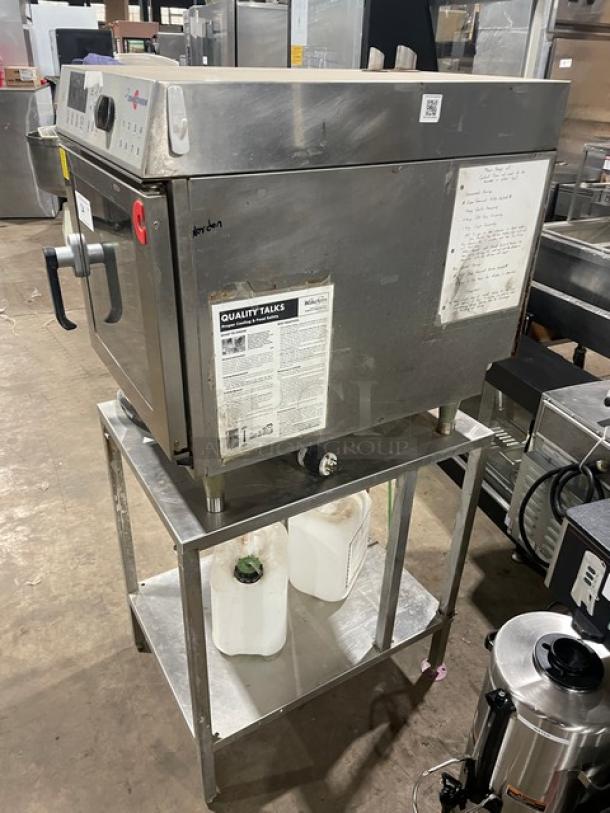 Convotherm stainless steel mini combi oven with digital controls on a single undershelf equipment stand, model OES6.10Mini.