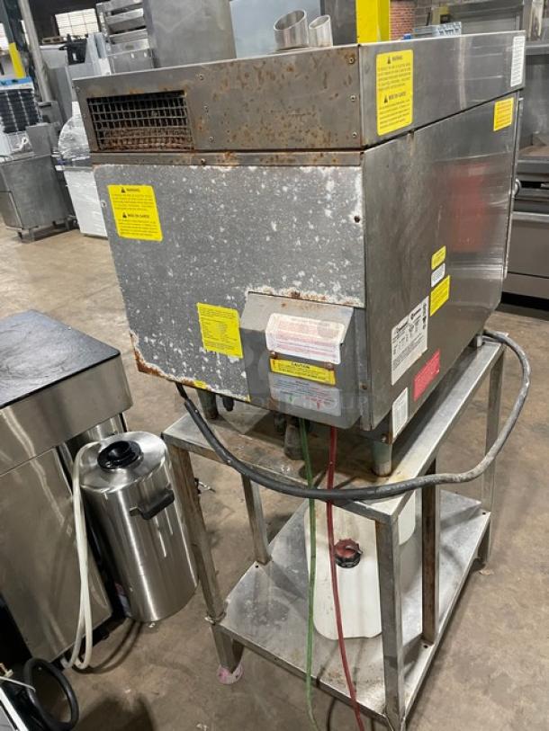 Convotherm stainless steel electric mini combi oven, model OES6.10Mini, with digital controls and undershelf stand. Visible wear.