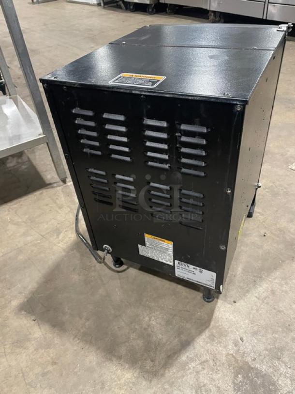 Bunn Model LCC2LP Commercial Electric Coffee Dispenser on legs, shown in black with visible labels, in good condition.