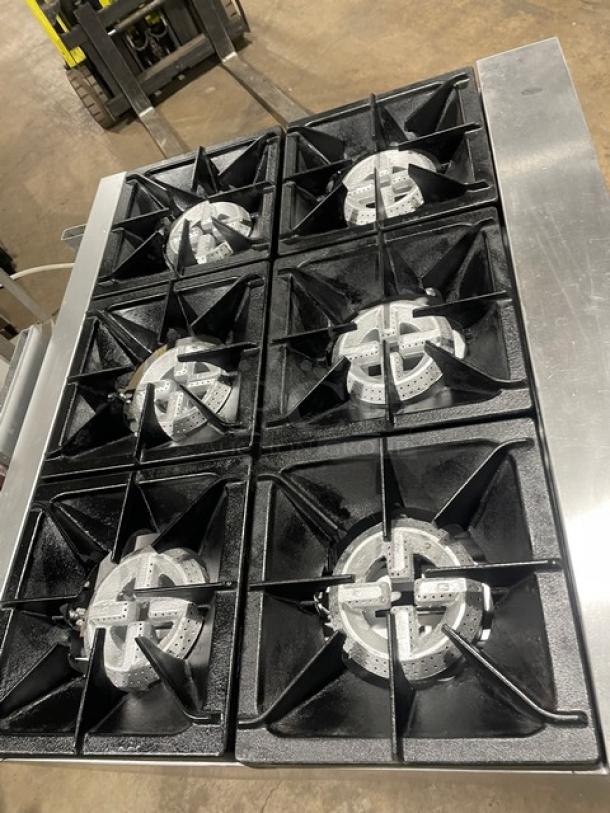 CPG Model 351S36N commercial stainless steel 6-burner natural gas range/oven combo with wired oven rack.