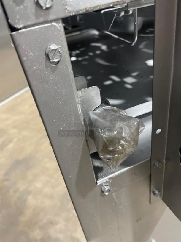 CPG Commercial 36" Stainless Steel Range/Oven Combo corner detail, showing metal construction. Model: 351S36N SN: 03224046.