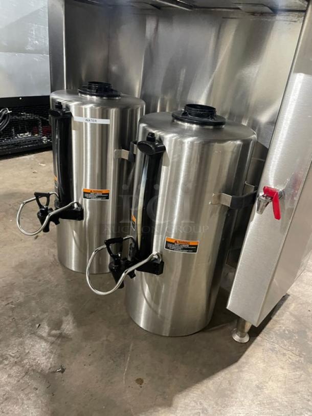 Fetco CBS-62H stainless steel twin coffee brewer with hot water dispenser, in good condition, on legs, 240V, 1 phase.