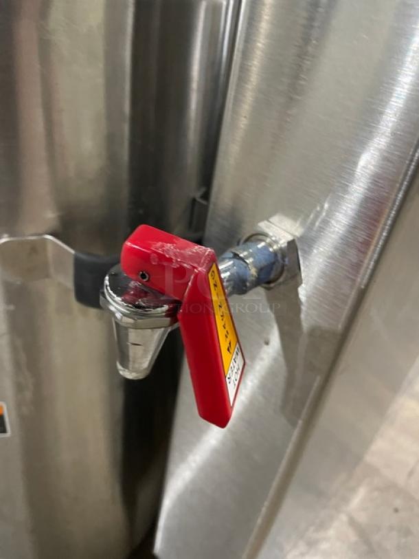 Fetco CBS-62H stainless steel coffee brewer with hot water dispenser, red spout, in good condition. Model CBS62H, 240V, 1 phase.